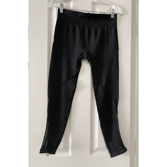 Used gently black Fabletics leggings, cut-out holes design. Seamless! - Picture 2 of 4